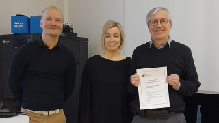 Palkinnon vastaanottajat.