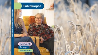 Oppaan kannen kuva upotettuna talvimaisemaan